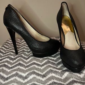 MK black shimmer pumps in size 7